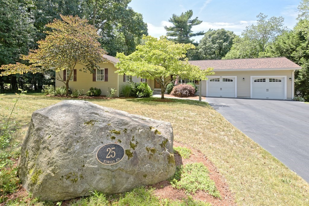 25 Edward Road Mendon, MA 01756 - Photo 1 of 42 a view of a house with a yard and large trees