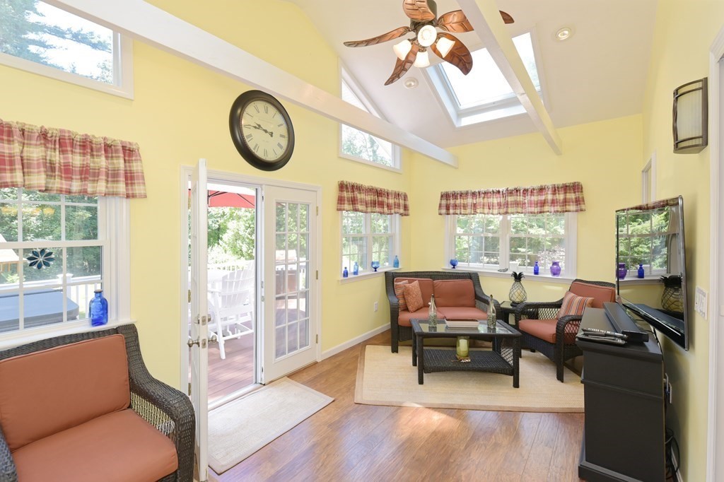 25 Edward Road Mendon, MA 01756 - Photo 13 of 42 a living room with furniture and a floor to ceiling window