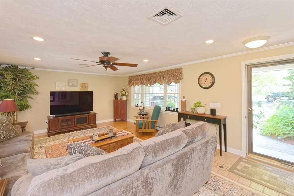 25 Edward Road Mendon, MA 01756 - Photo 3 of 42 a living room with furniture and a flat screen tv