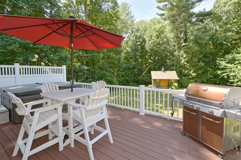 25 Edward Road Mendon, MA 01756 - Photo 36 of 42 a view of a patio with a table and chairs