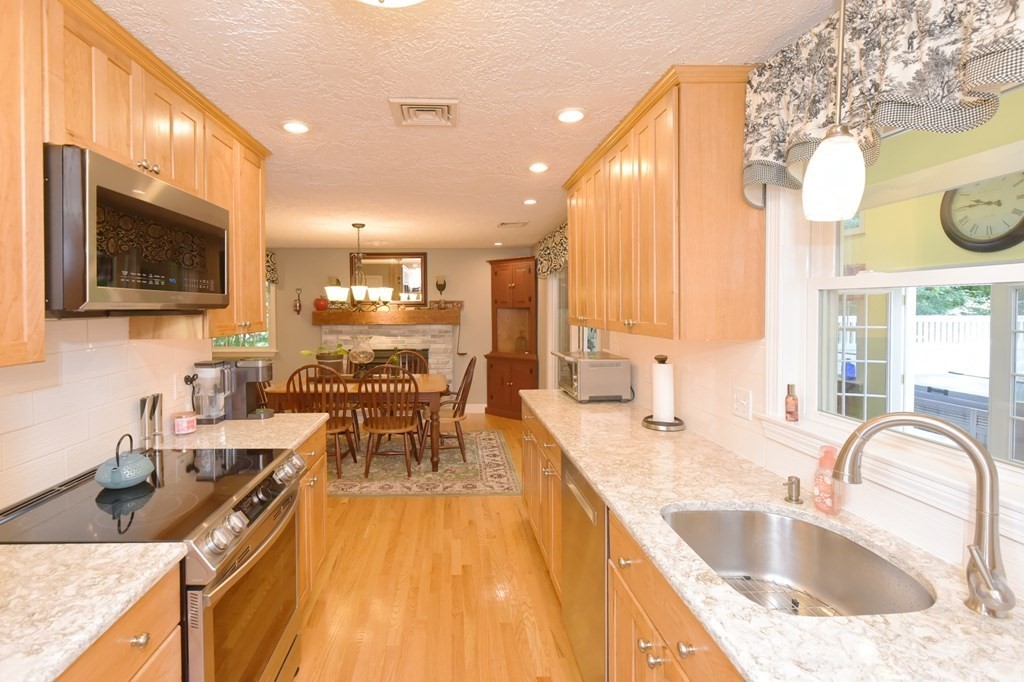 25 Edward Road Mendon, MA 01756 - Photo 5 of 42 a kitchen with counter top space a sink and appliances