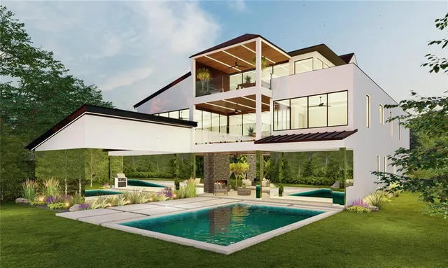 a backyard of a house with lots of green space