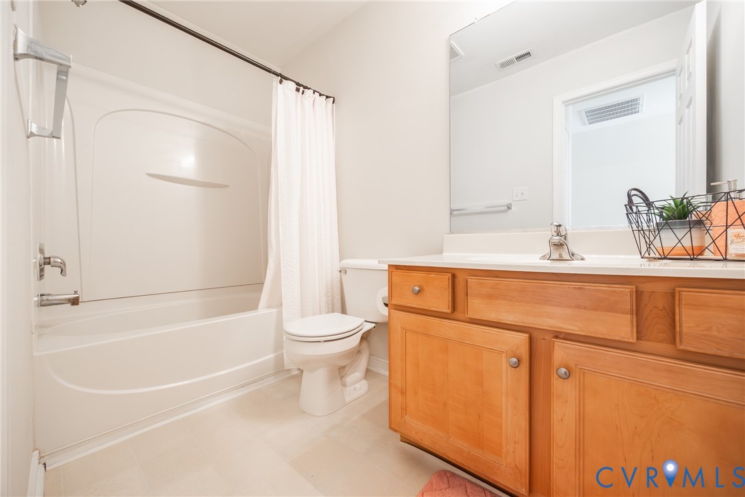 2928 Heather Ridge Drive Henrico, VA 23231 - Photo 23 of 34 Bathroom featuring a white bathtub and shower comb
