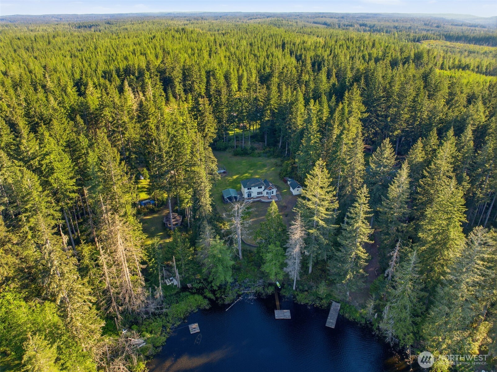 6971 Northeast Tahuya Blacksmith Road Belfair, WA 98528 - Photo 31 of 38 a view of a garden