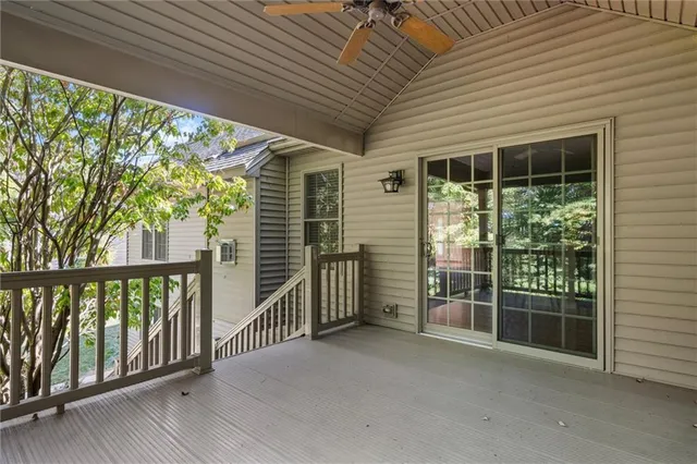 a view of a porch with wooden floor