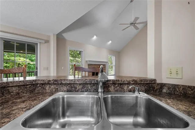 a kitchen with a sink and a window