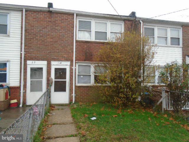 2904 Freeway Baltimore, MD 21227 - Photo 1 of 1 front view of a house with a yard