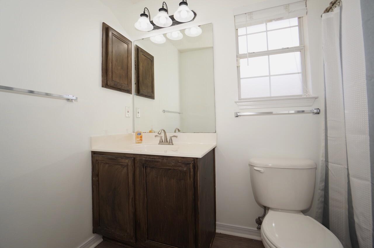 440 Sandy Cay Drive Miramar Beach, FL 32550 - Photo 18 of 48 a bathroom with a toilet a sink and mirror