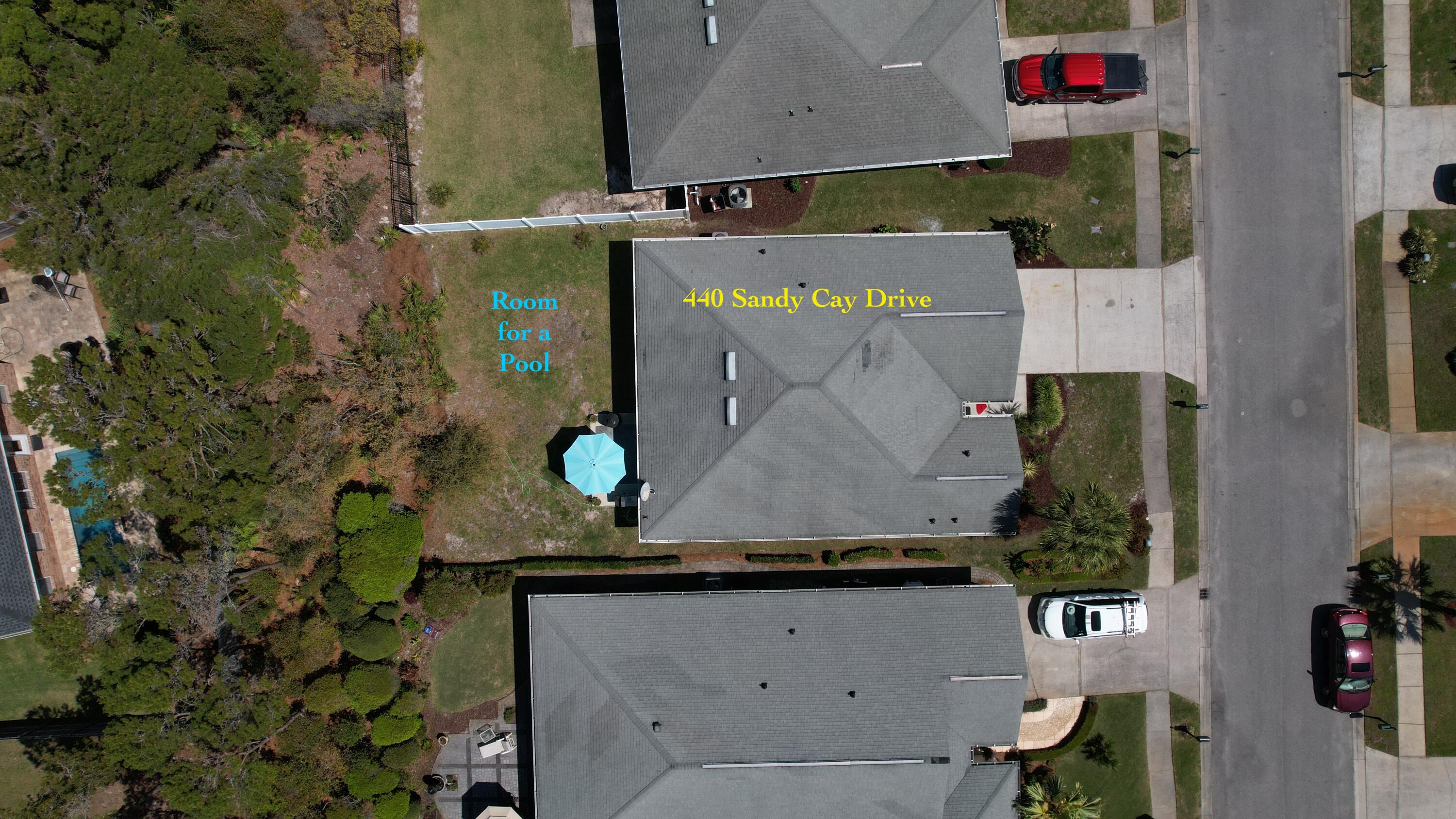 440 Sandy Cay Drive Miramar Beach, FL 32550 - Photo 27 of 48 an aerial view of residential houses with outdoor space