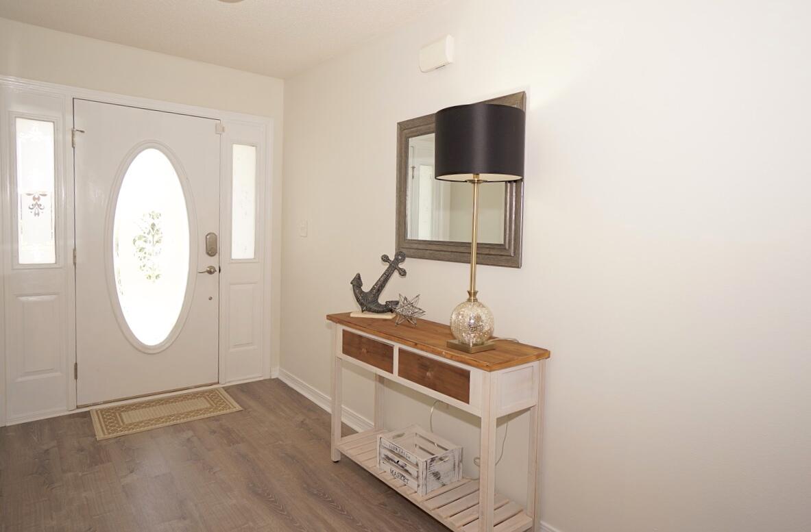 440 Sandy Cay Drive Miramar Beach, FL 32550 - Photo 4 of 48 an entryway with wooden floor and cabinet