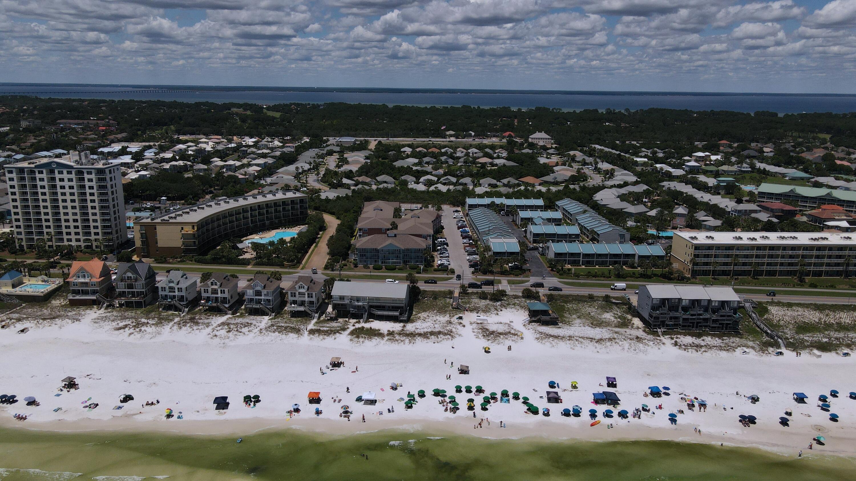 440 Sandy Cay Drive Miramar Beach, FL 32550 - Photo 41 of 48 a view of water heater and room with wooden floor