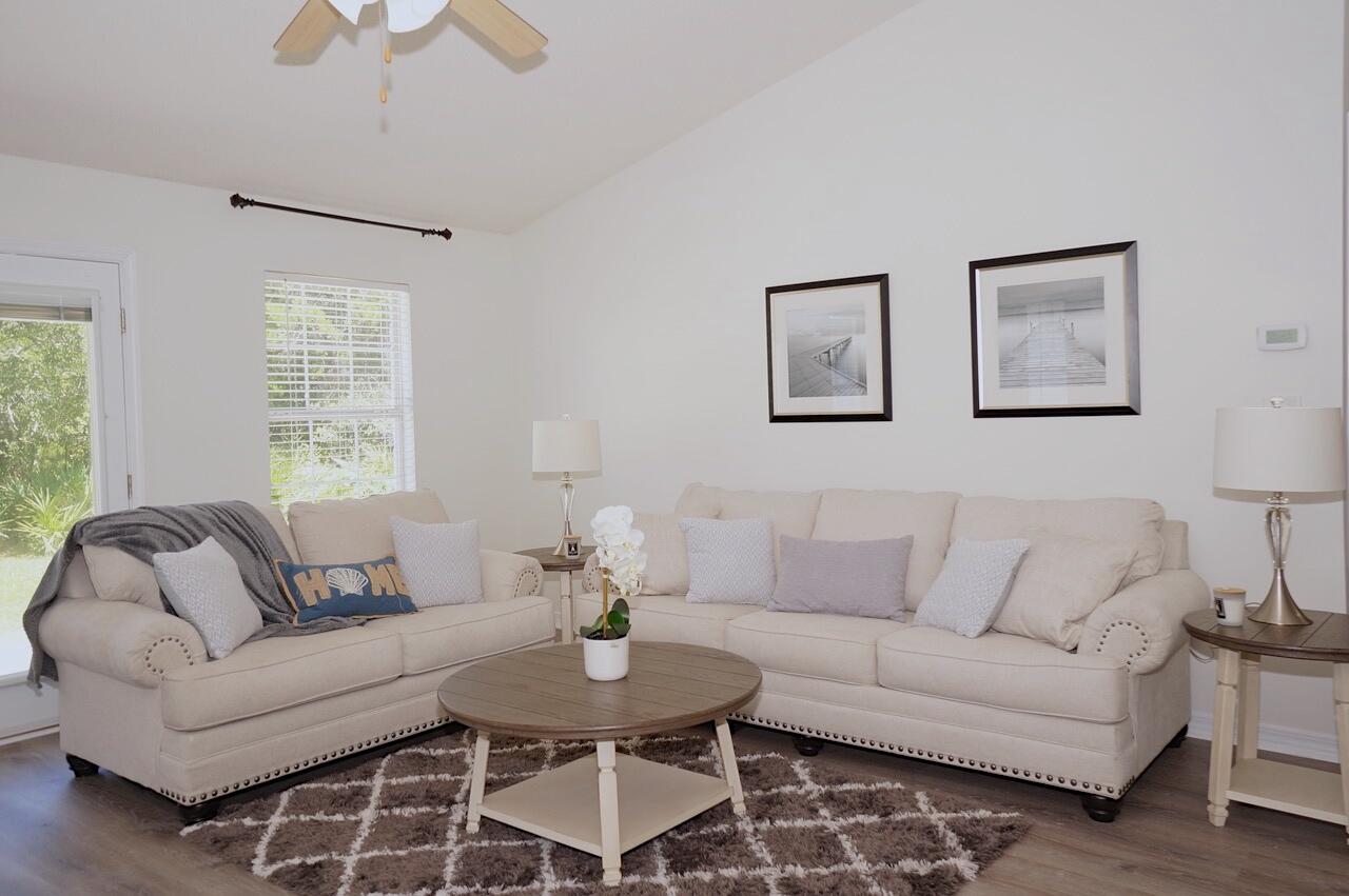 440 Sandy Cay Drive Miramar Beach, FL 32550 - Photo 7 of 48 a living room with furniture and a large window