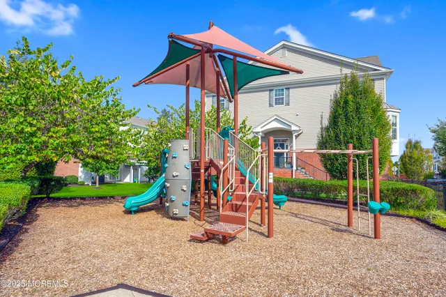 a view of a house with a park