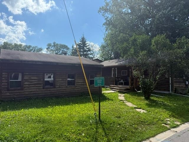 102 North Main Street Byron, IL 61010 - Photo 1 of 16 a view of a house with backyard