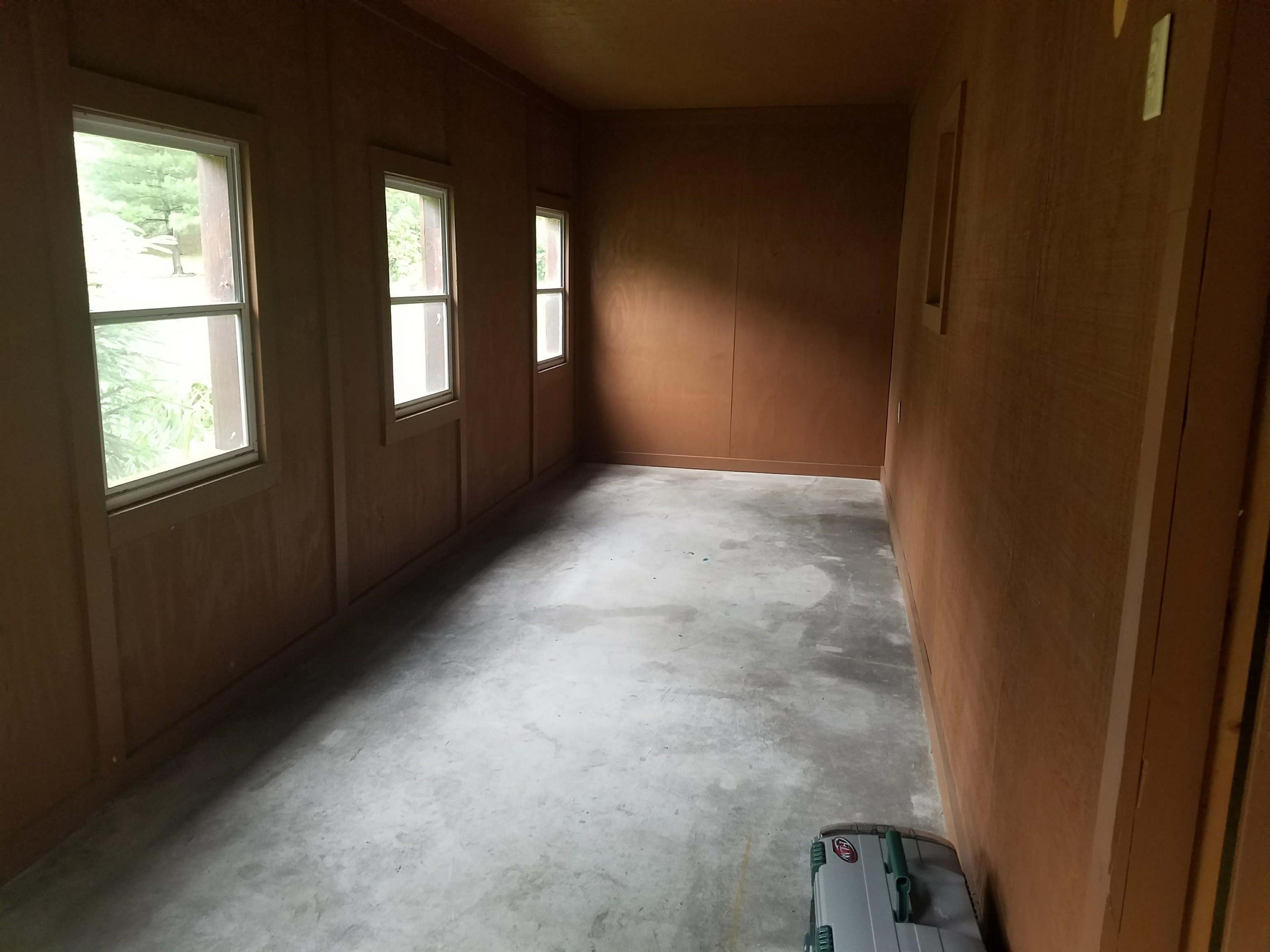 102 North Main Street Byron, IL 61010 - Photo 13 of 16 a view of an empty room with windows