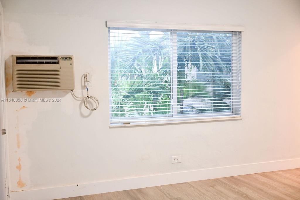 345 85th Street Miami Beach, FL 33141 - Photo 11 of 26 a view of a window in a room