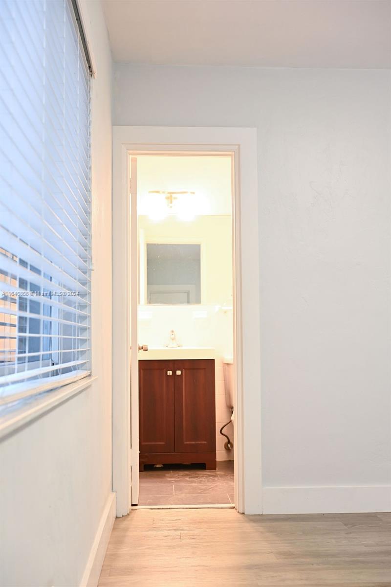 345 85th Street Miami Beach, FL 33141 - Photo 14 of 26 a view of an empty room and window