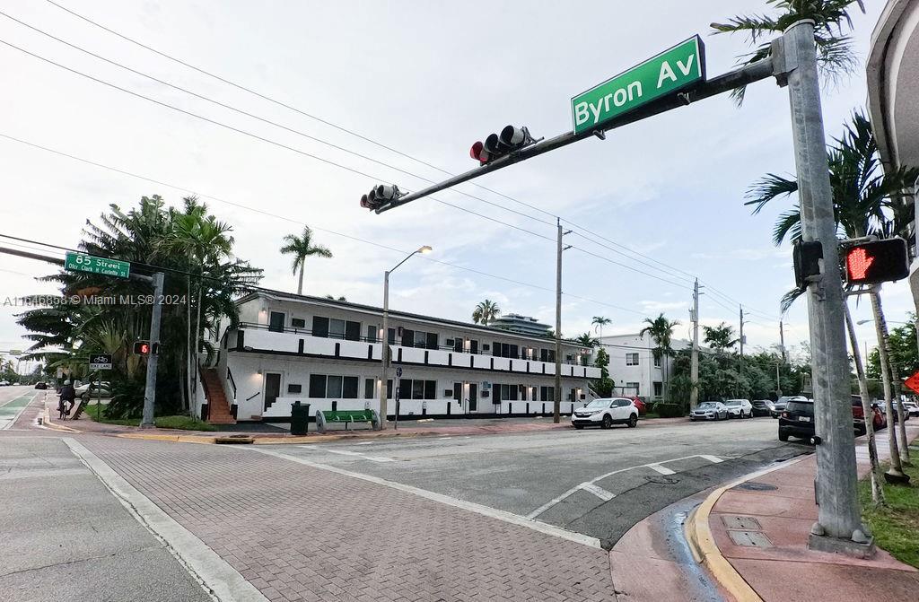 345 85th Street Miami Beach, FL 33141 - Photo 7 of 26 a view of a city street lined with buildings and trees