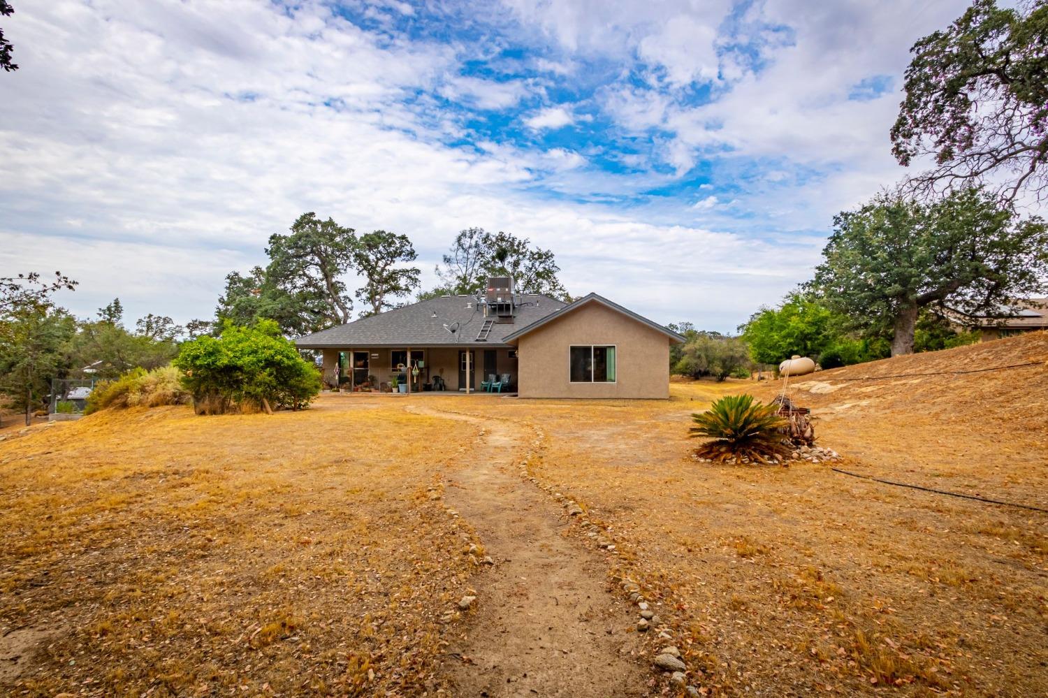 30093 Revis Road Coarsegold, CA 93614 - Photo 38 of 48 View of house from back garden