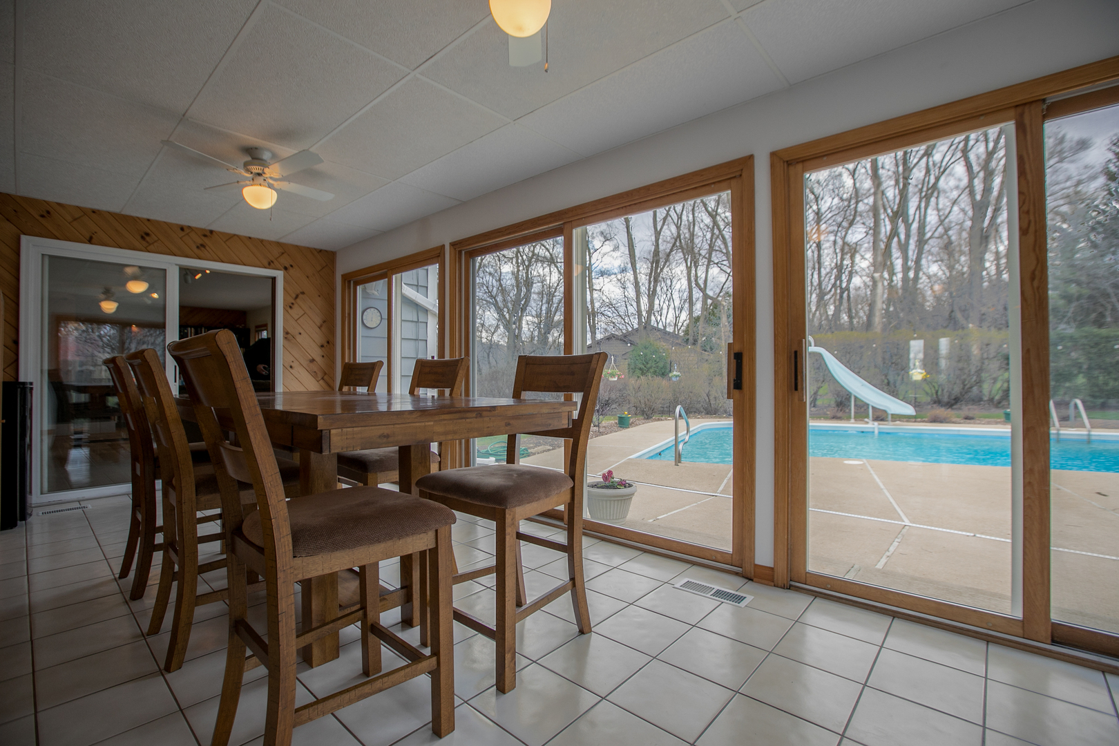 16N560 Sumter Drive Dundee, IL 60118 - Photo 23 of 49 a view of a dining room with furniture window and outside view