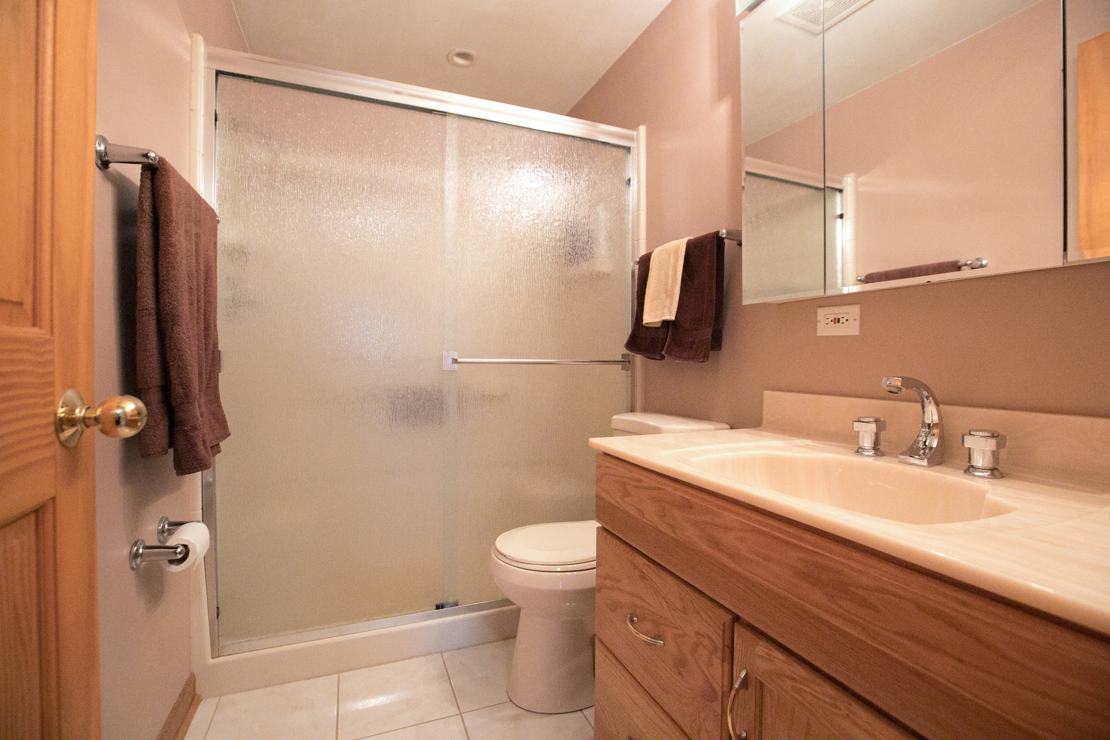 16N560 Sumter Drive Dundee, IL 60118 - Photo 34 of 49 a bathroom with a granite countertop sink toilet and shower