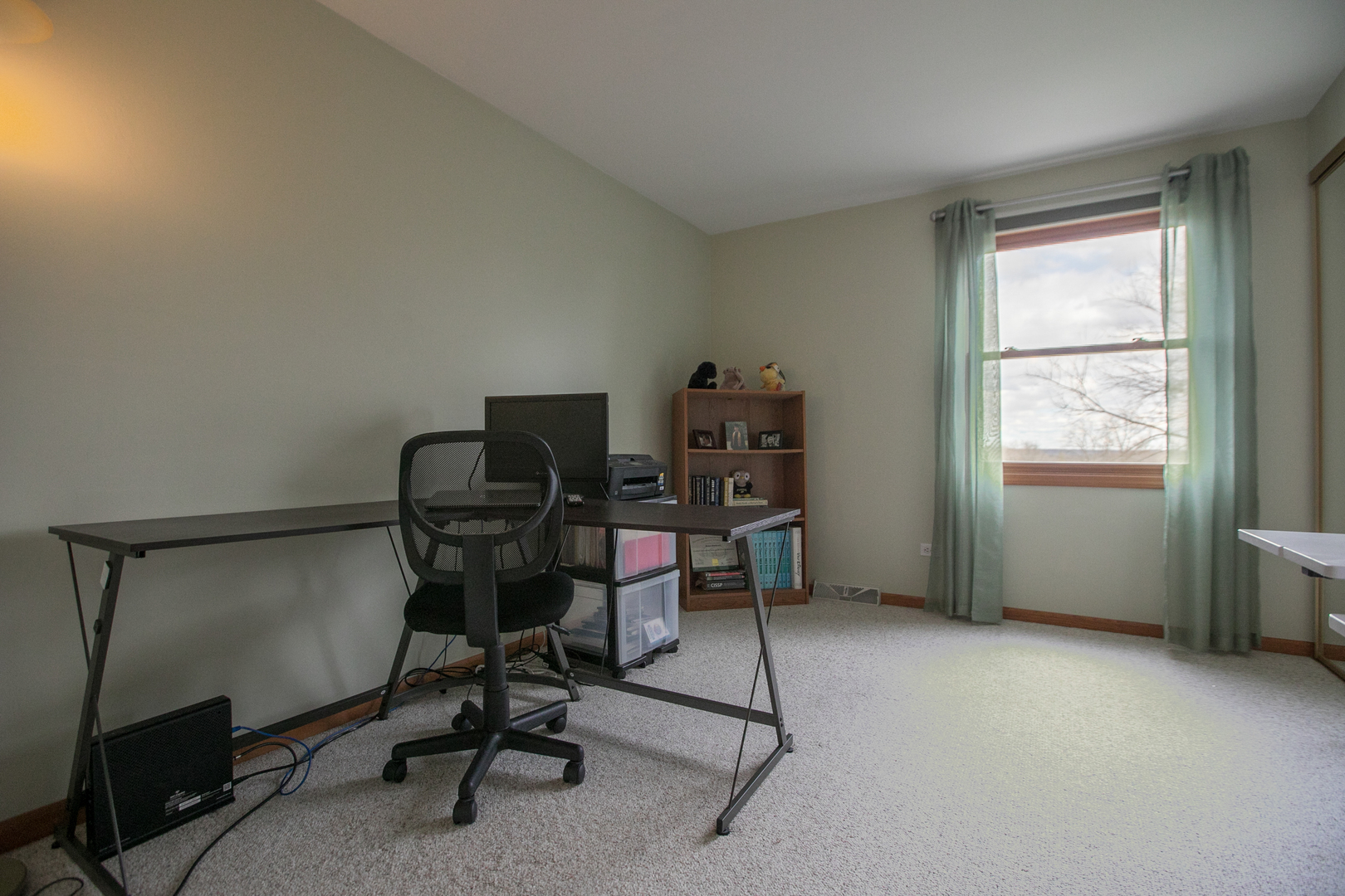 16N560 Sumter Drive Dundee, IL 60118 - Photo 39 of 49 a view of a workspace with furniture and a window