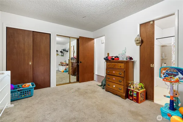 a view of a bedroom with toys
