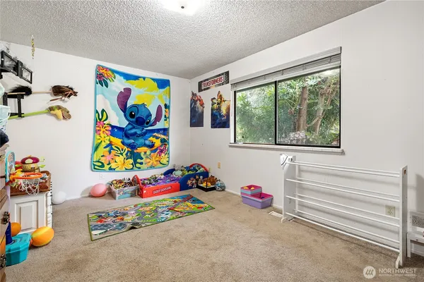 a room with toys and a window