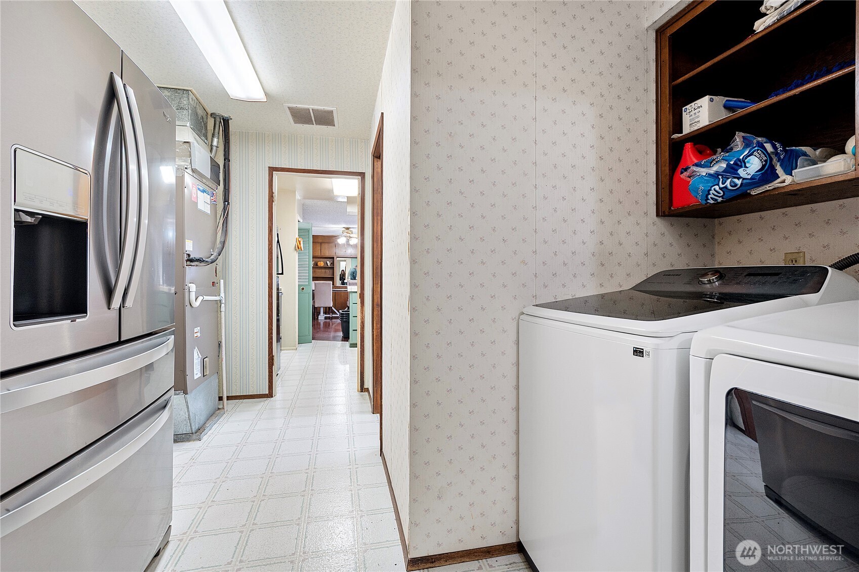 26707 Orville Road East Orting, WA 98360 - Photo 15 of 36 a view of a storage and utility room with washer and dryer