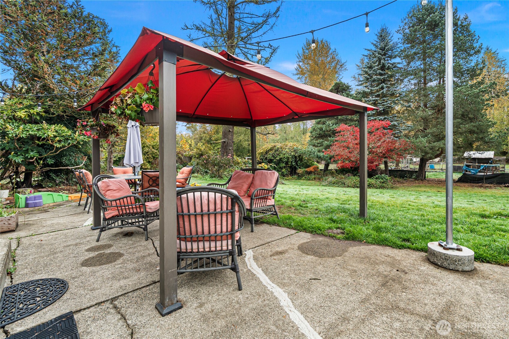 26707 Orville Road East Orting, WA 98360 - Photo 21 of 36 a view of a house with backyard and sitting area