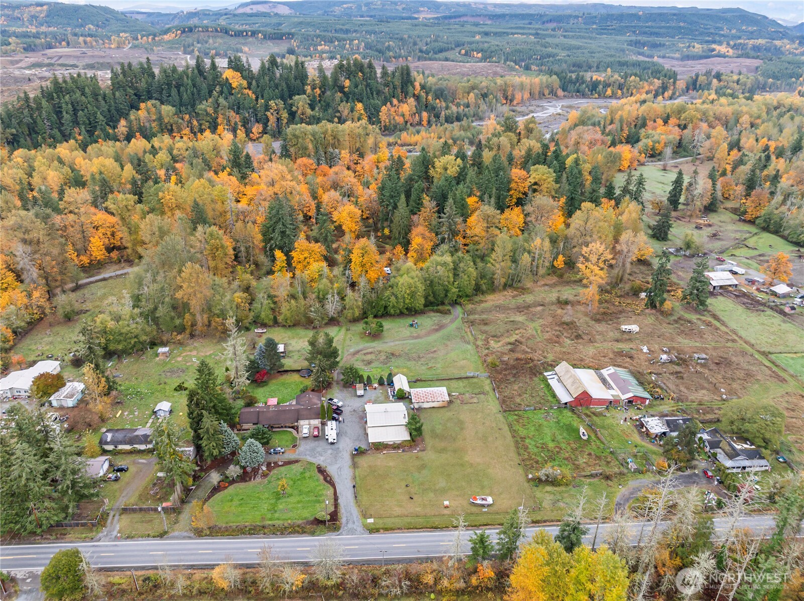 26707 Orville Road East Orting, WA 98360 - Photo 27 of 36 an aerial view of a house with a yard