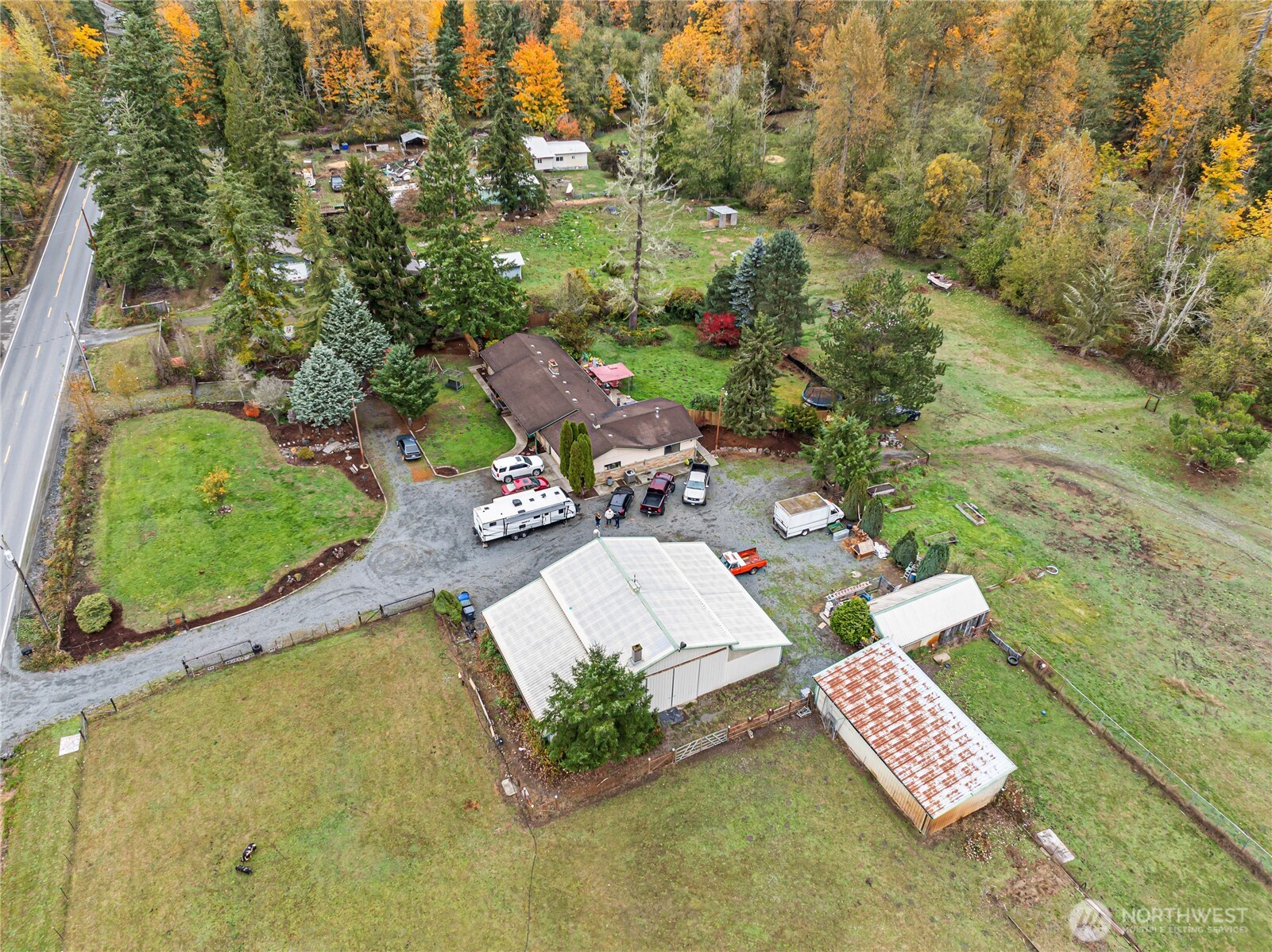 26707 Orville Road East Orting, WA 98360 - Photo 30 of 36 an aerial view of a residential houses with yard