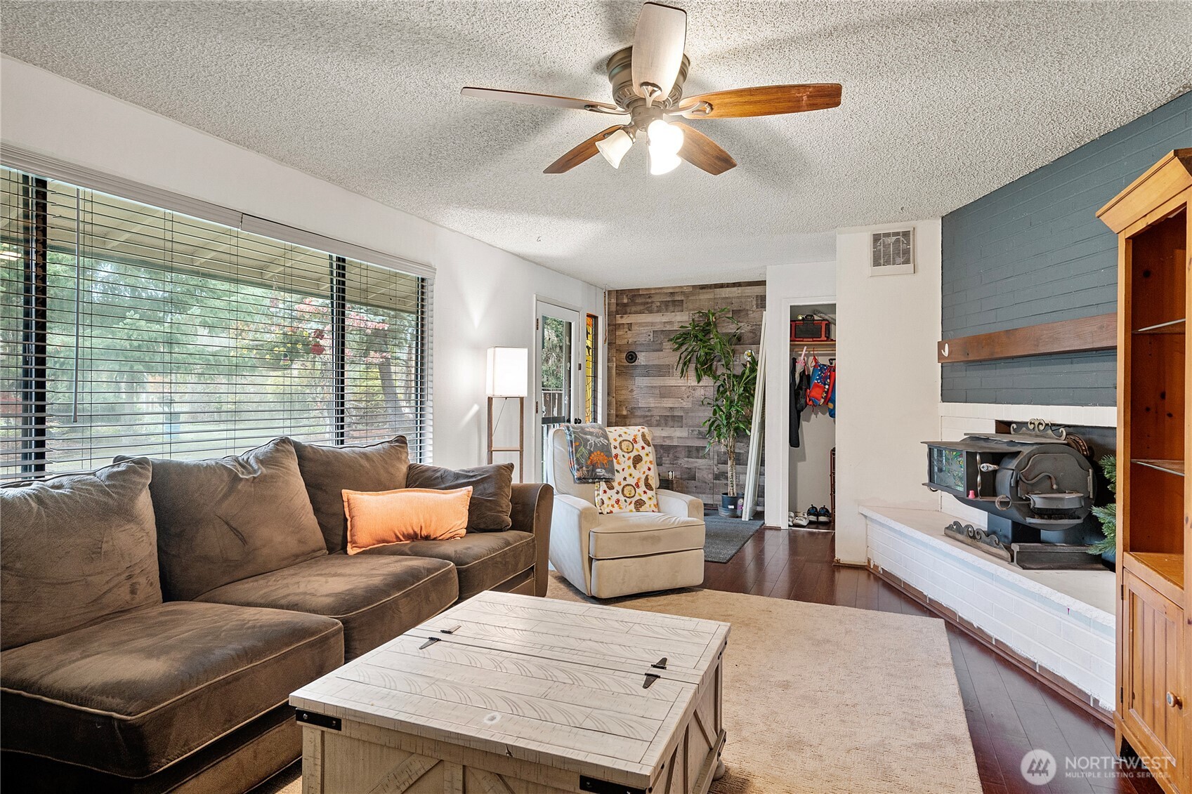 26707 Orville Road East Orting, WA 98360 - Photo 4 of 36 a living room with furniture and a large window