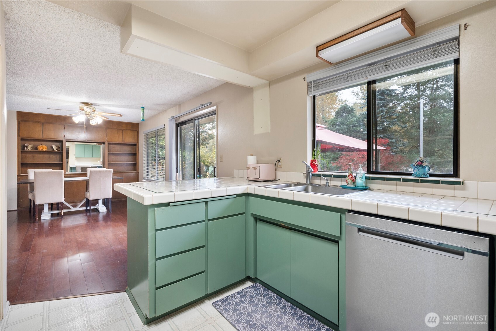26707 Orville Road East Orting, WA 98360 - Photo 8 of 36 a kitchen with sink and large window