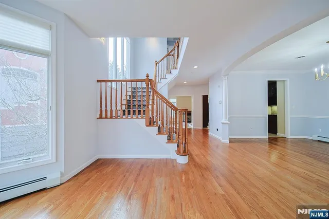 a view of entryway with wooden floor