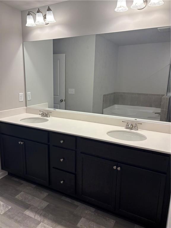 5274 Fox Den Road Oakwood, GA 30566 - Photo 7 of 10 a bathroom with a sink and a mirror