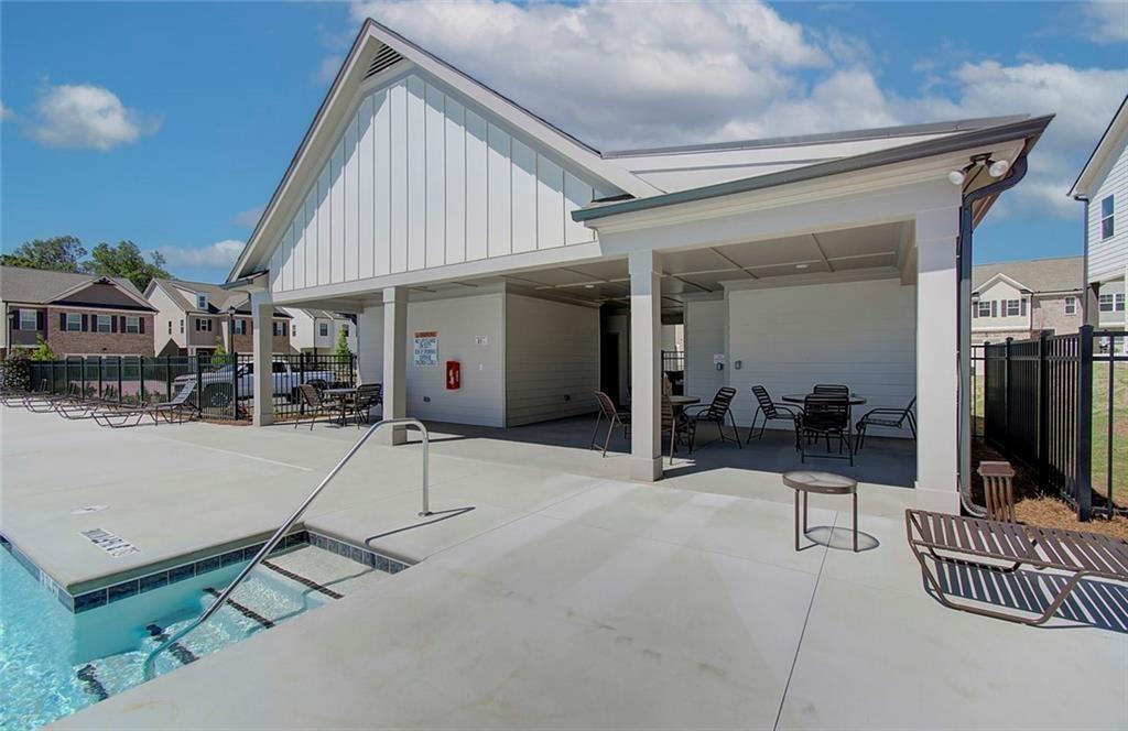 5274 Fox Den Road Oakwood, GA 30566 - Photo 9 of 10 a view of a house with patio