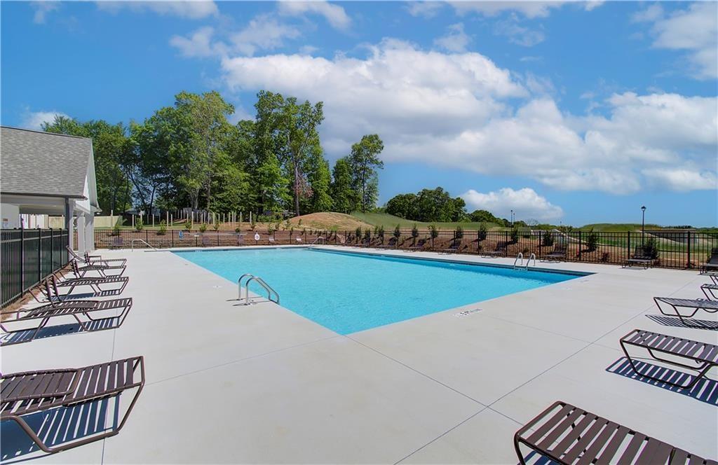 5274 Fox Den Road Oakwood, GA 30566 - Photo 10 of 10 a view of a swimming pool and lake view