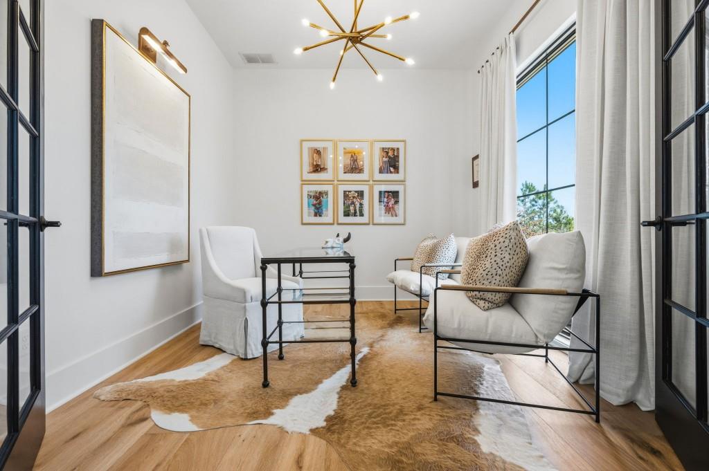 287 Mountain View Ridge Northwest Marietta, GA 30064 - Photo 11 of 77 a living room with furniture a rug and white walls