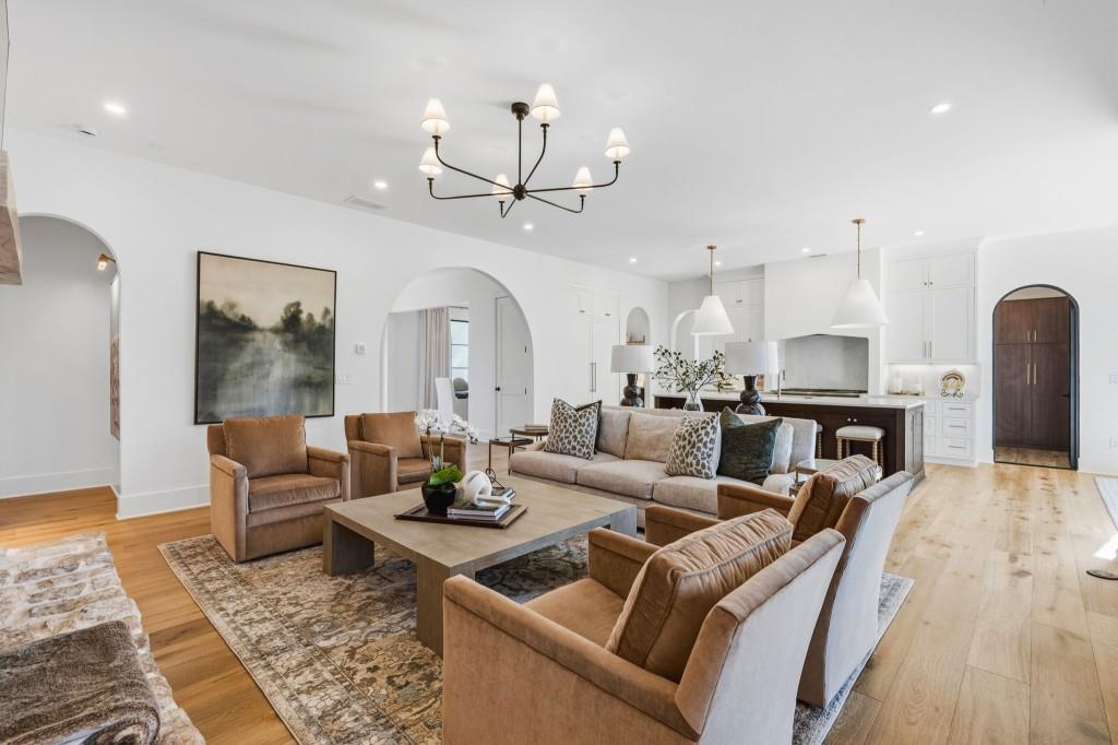 287 Mountain View Ridge Northwest Marietta, GA 30064 - Photo 20 of 77 a living room with furniture kitchen view and a chandelier