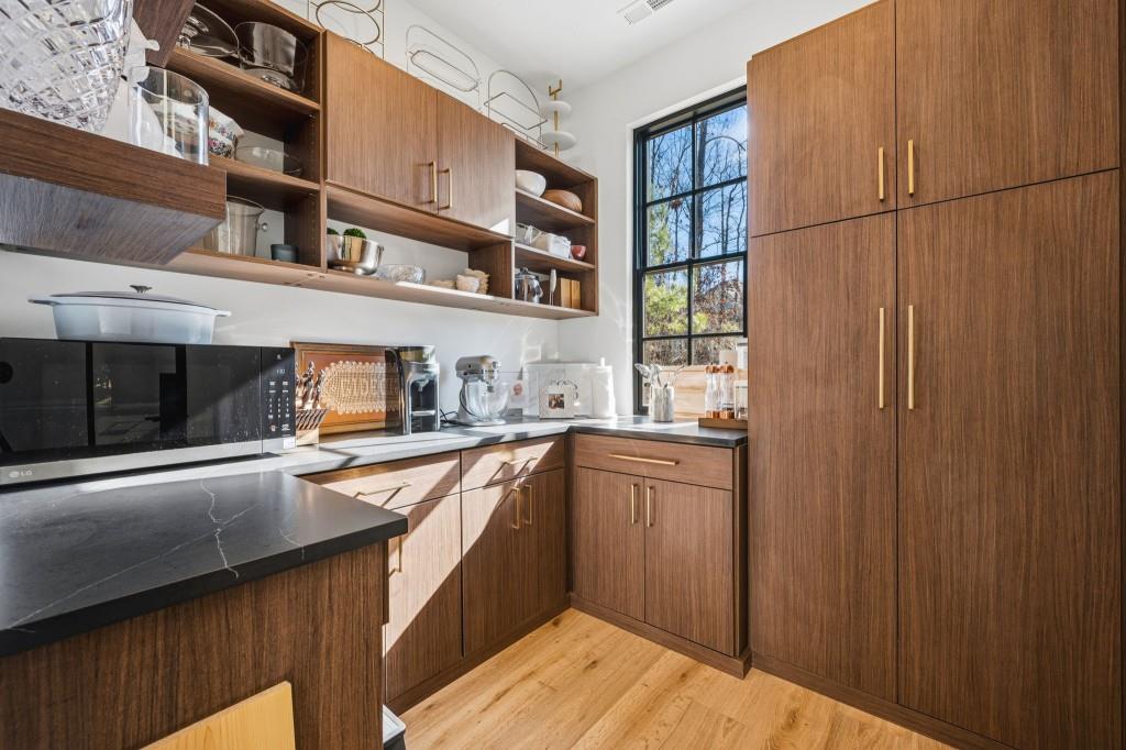 287 Mountain View Ridge Northwest Marietta, GA 30064 - Photo 34 of 77 a kitchen with stainless steel appliances granite countertop a refrigerator and a stove top oven