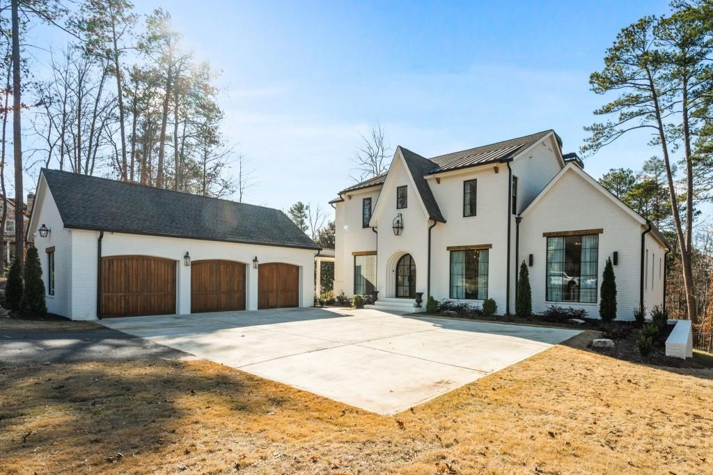 287 Mountain View Ridge Northwest Marietta, GA 30064 - Photo 5 of 77 a front view of a house with a yard