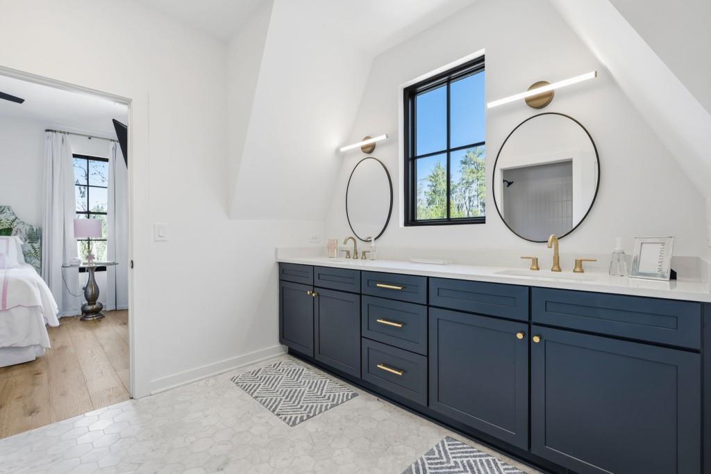 287 Mountain View Ridge Northwest Marietta, GA 30064 - Photo 52 of 77 a bathroom with a granite countertop double vanity sink and a mirror