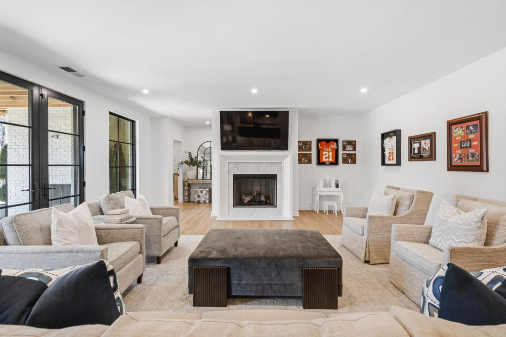 287 Mountain View Ridge Northwest Marietta, GA 30064 - Photo 65 of 77 a living room with furniture and a fireplace