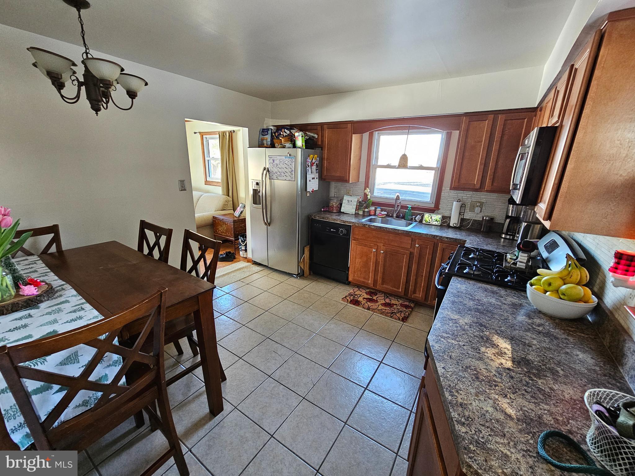 16 Sewall Road Bridgeton, NJ 08302 - Photo 3 of 20 a view of a dining room with furniture
