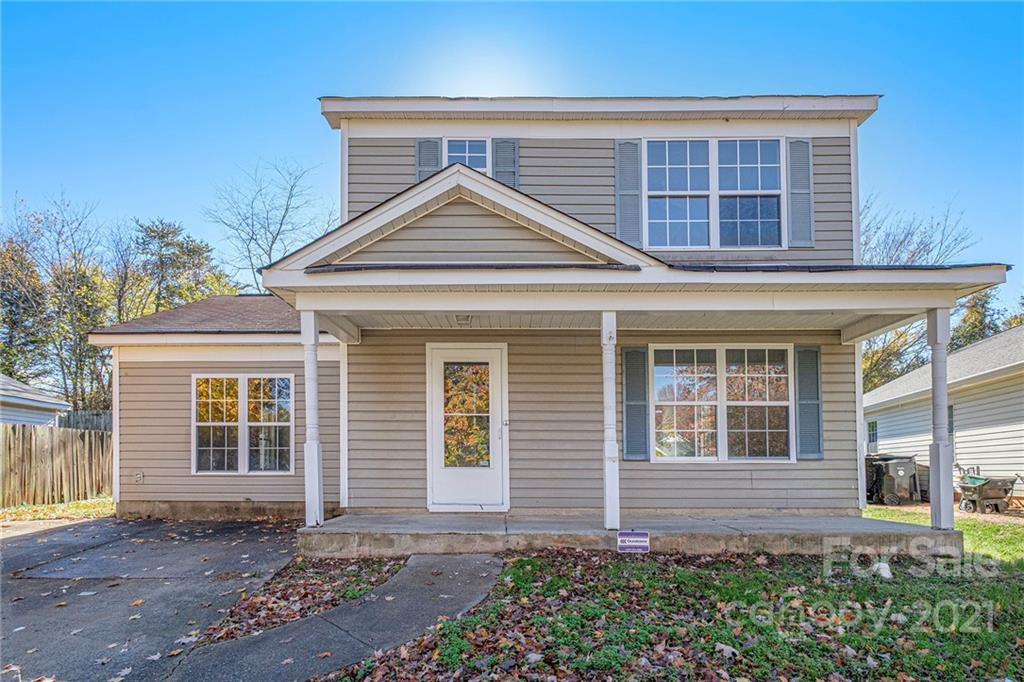 3021 Winners Circle Southwest Concord, NC 28025 - Photo 1 of 20 front view of a house with a yard