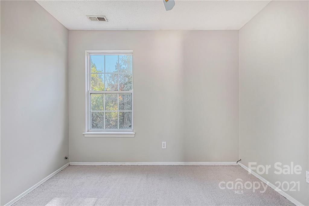 3021 Winners Circle Southwest Concord, NC 28025 - Photo 14 of 20 an empty room with a window