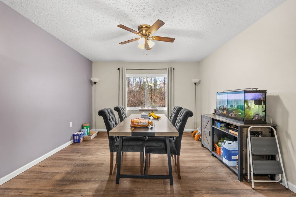 250 McDeerman Road Jacksboro, TN 37757 - Photo 6 of 25 a workspace with furniture window and wooden floor
