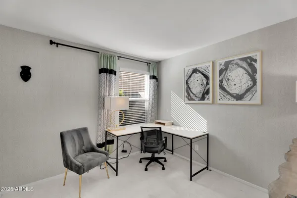 a bathroom with a sink a toilet and shower curtain