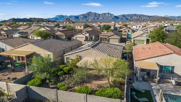 an aerial view of a house with a garden